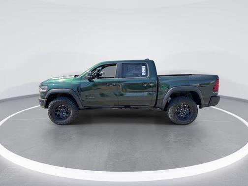 Serrano Green Metallic 2026 RAM 1500 RHO Crew Cab 4x4 5'7' Box