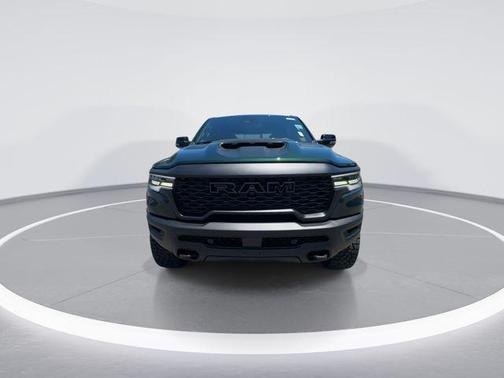 Serrano Green Metallic 2026 RAM 1500 RHO Crew Cab 4x4 5'7' Box