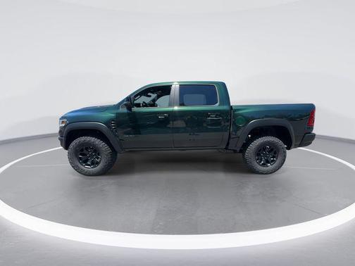 Serrano Green Metallic 2026 RAM 1500 RHO Crew Cab 4x4 5'7' Box