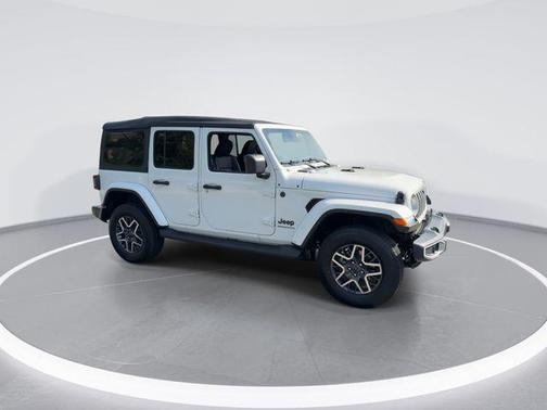bright white clearcoat 2026 Jeep Wrangler 4-Door Sahara 4x4
