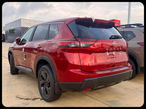 Scarlet Ember Tintcoat 2026 Nissan Rogue SV