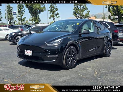 Solid Black 2025 Tesla Model Y Long Range
