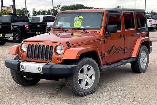 Mango Tango Pearlcoat 2011 Jeep Wrangler Unlimited Sahara