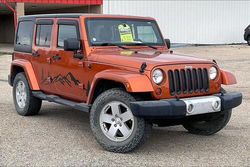 Mango Tango Pearlcoat 2011 Jeep Wrangler Unlimited Sahara