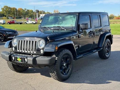 Black 2016 Jeep Wrangler Unlimited Sahara