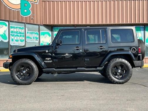 Black 2016 Jeep Wrangler Unlimited Sahara