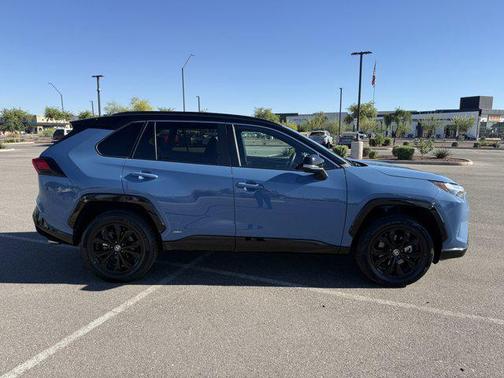 Cavalry Blue/Midnight Black Metallic 2023 Toyota RAV4 Hybrid SE