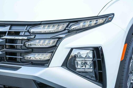 Creamy White Pearl 2026 Hyundai TUCSON Hybrid Blue SE