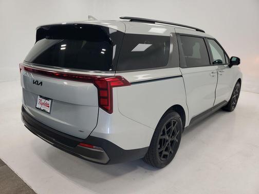 Ivory Silver 2025 Kia Carnival Hybrid SX