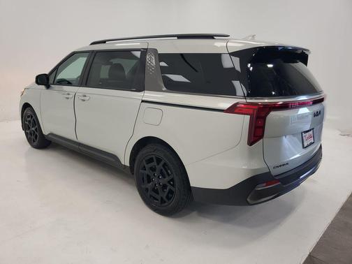 Ivory Silver 2025 Kia Carnival Hybrid SX