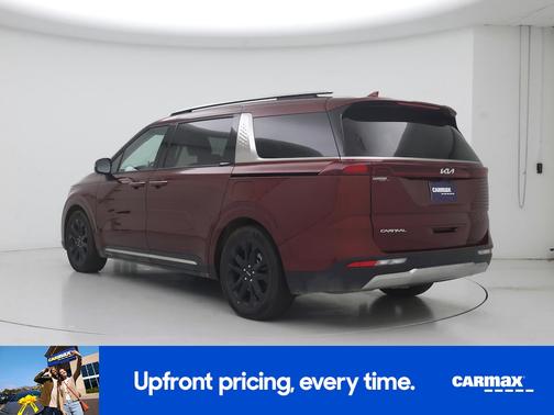 Burgundy 2024 Kia Carnival SX Prestige