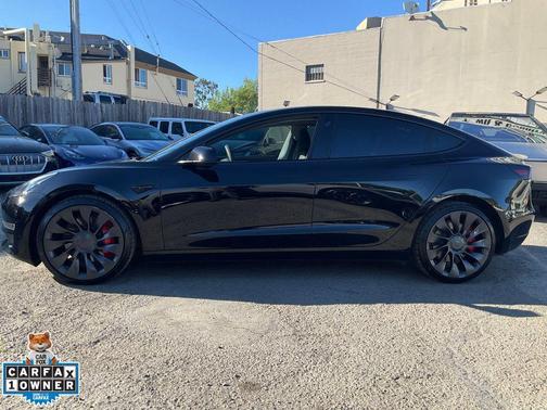 Solid Black 2023 Tesla Model 3 Performance