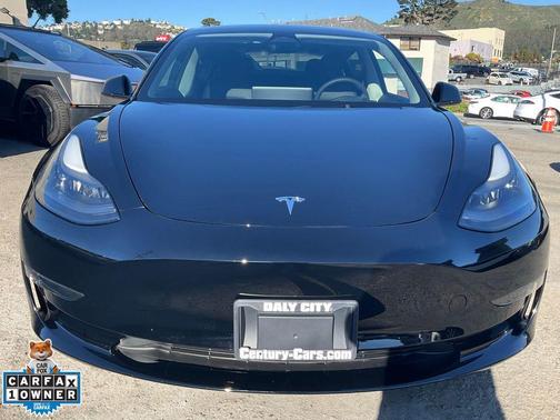 Solid Black 2023 Tesla Model 3 Performance