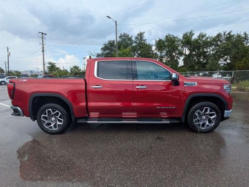 Volcanic Red Tintcoat 2025 GMC Sierra 1500 SLT