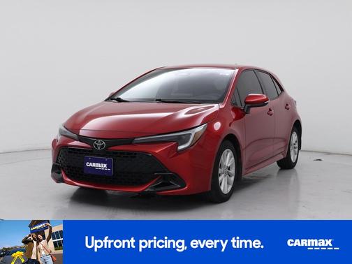 Red 2024 Toyota Corolla Hatchback SE