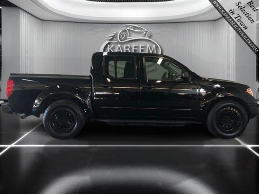 Super Black 2009 Nissan Frontier SE Crew Cab