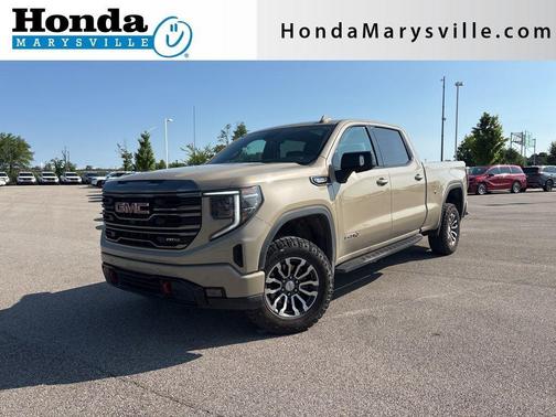 Desert Sand Metallic 2023 GMC Sierra 1500 AT4