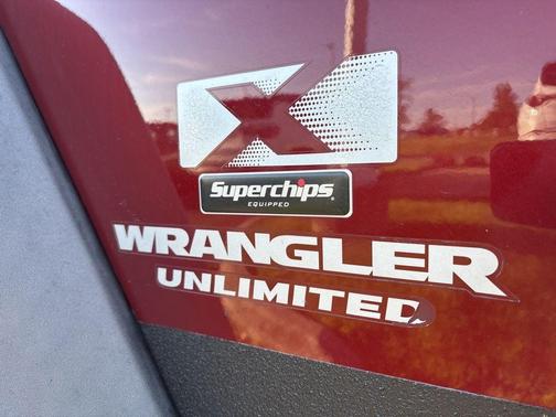 Red Rock Crystal Pearlcoat / Black Soft Top 2009 Jeep Wrangler Unlimited X