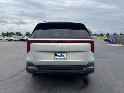 Ivory Silver 2025 Kia Carnival SX