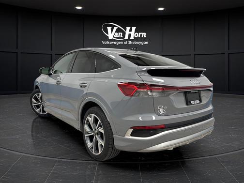 Pebble Gray 2024 Audi Q4 e-tron Sportback Premium 55 quattro