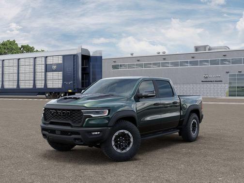 Serrano Green Metallic 2026 RAM 1500 RHO Crew Cab 4x4 5'7' Box