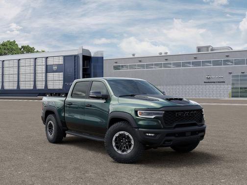 Serrano Green Metallic 2026 RAM 1500 RHO Crew Cab 4x4 5'7' Box