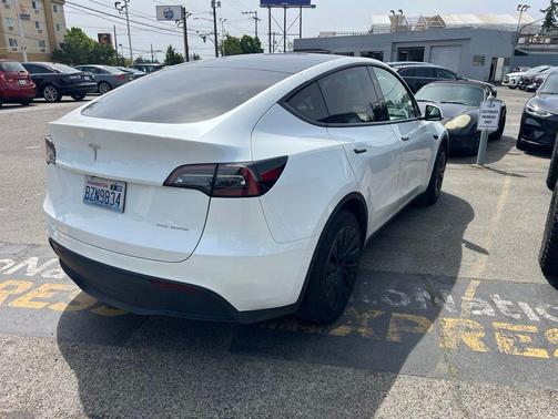 Pearl White Multi-Coat 2024 Tesla Model Y Long Range Dual Motor All-Wheel Drive