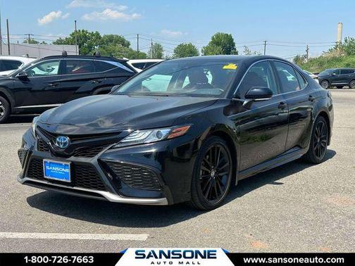 Midnight Black 2024 Toyota Camry Hybrid SE