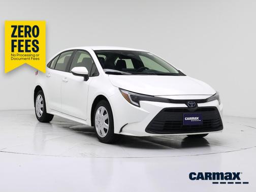 White 2023 Toyota Corolla Hybrid LE