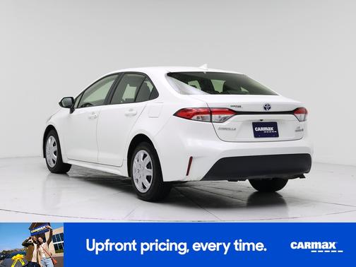 White 2023 Toyota Corolla Hybrid LE