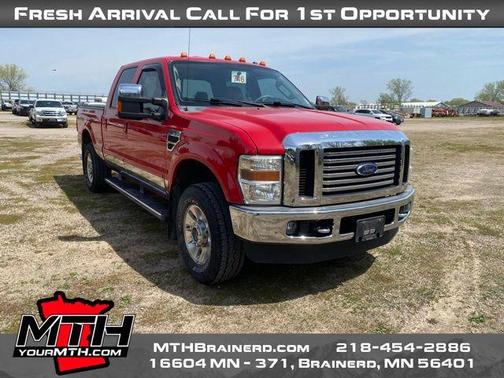 Red 2010 Ford F-250 Lariat