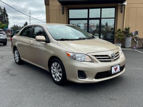 Sandy Beach Metallic 2013 Toyota Corolla LE