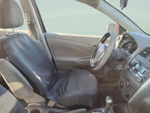 Red Brick 2015 Nissan Versa SV