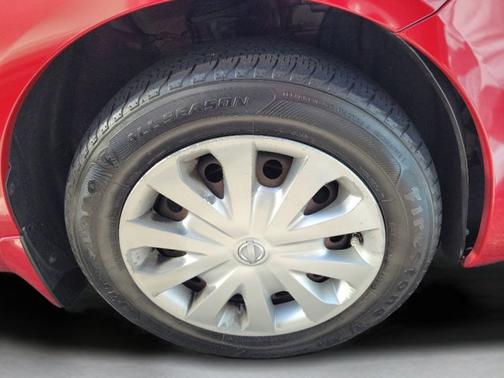 Red Brick 2015 Nissan Versa SV