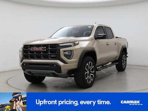 Tan 2024 GMC Canyon AT4