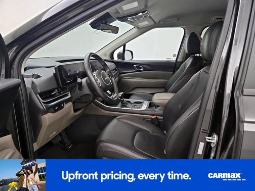 Gray 2025 Kia Carnival LXS