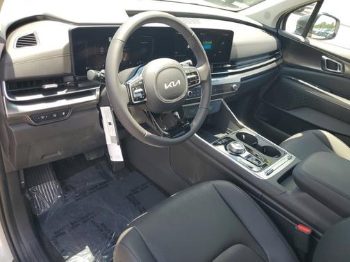 Ivory Silver 2026 Kia Carnival Hybrid SX
