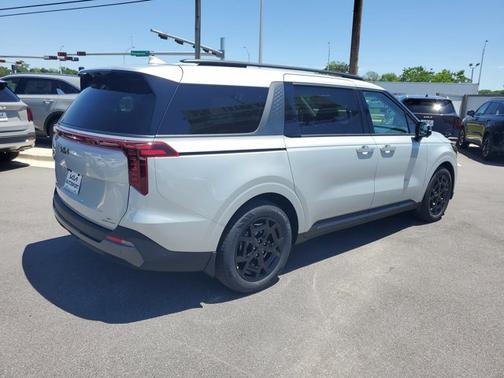 Ivory Silver 2026 Kia Carnival Hybrid SX Prestige