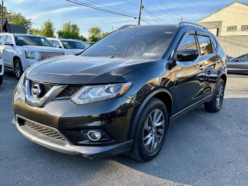 Green 2016 Nissan Rogue SL
