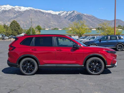 Radiant Red Metallic 2026 Honda CR-V Hybrid Sport Touring AWD