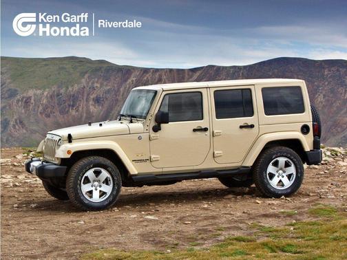 Black Clearcoat 2011 Jeep Wrangler Unlimited Sport