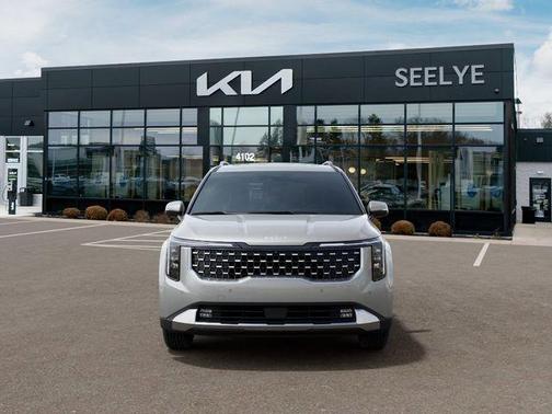 Ivory Silver 2026 Kia Carnival Hybrid SX