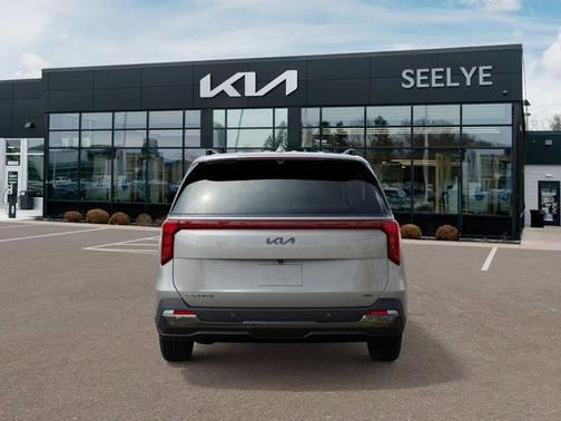 Ivory Silver 2026 Kia Carnival Hybrid SX