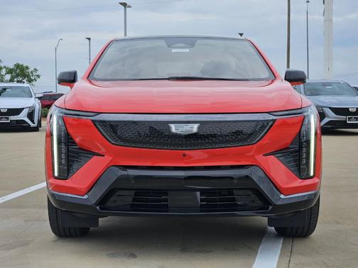 Orange 2026 Cadillac OPTIQ Sport