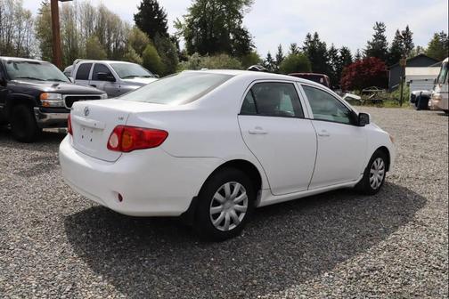 Super White 2010 Toyota Corolla LE