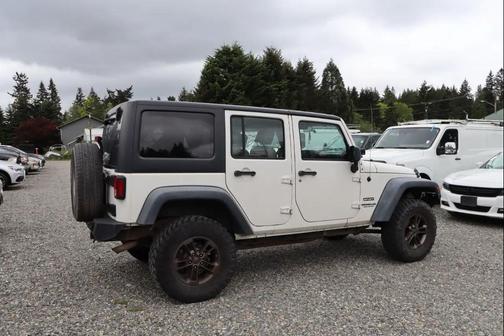 White 2010 Jeep Wrangler Unlimited Sport