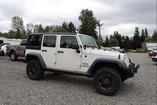 White 2010 Jeep Wrangler Unlimited Sport