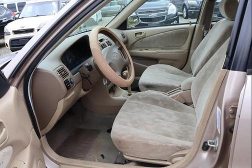 Beige 2000 Toyota Corolla LE