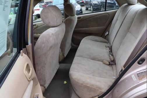 Beige 2000 Toyota Corolla LE