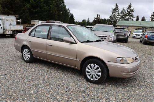 Beige 2000 Toyota Corolla LE